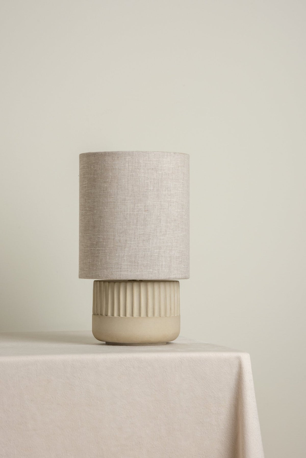 Enza Small Warm White Ribbed Concrete Table Lamp