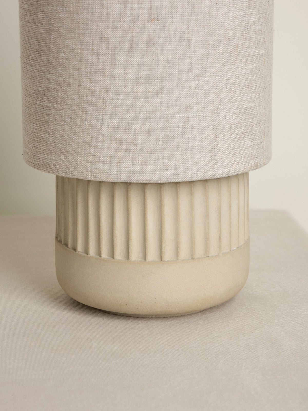 Enza Small Warm White Ribbed Concrete Table Lamp
