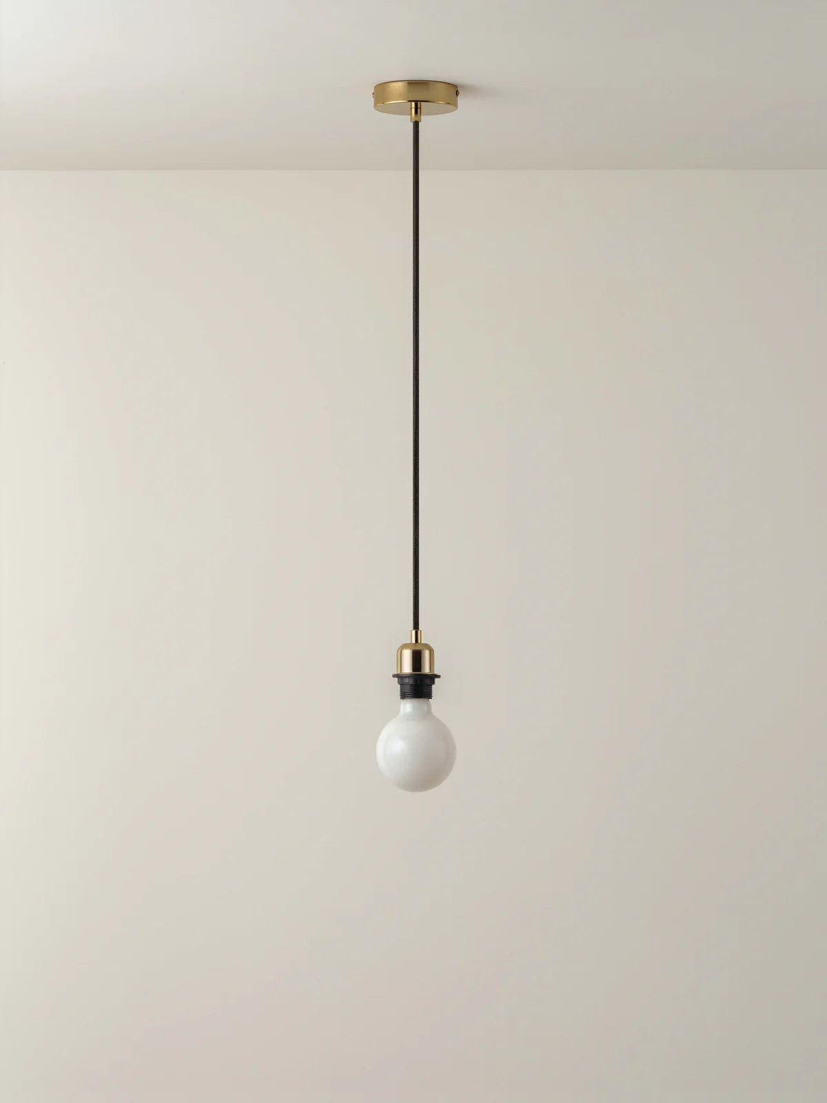 Pendant light with a white bulb - Loom Collection