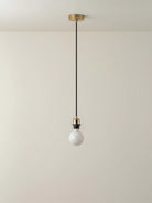 Pendant light with a white bulb - Loom Collection