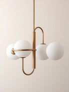 Decora - 4 Light Aged Brass & Opal Pendant