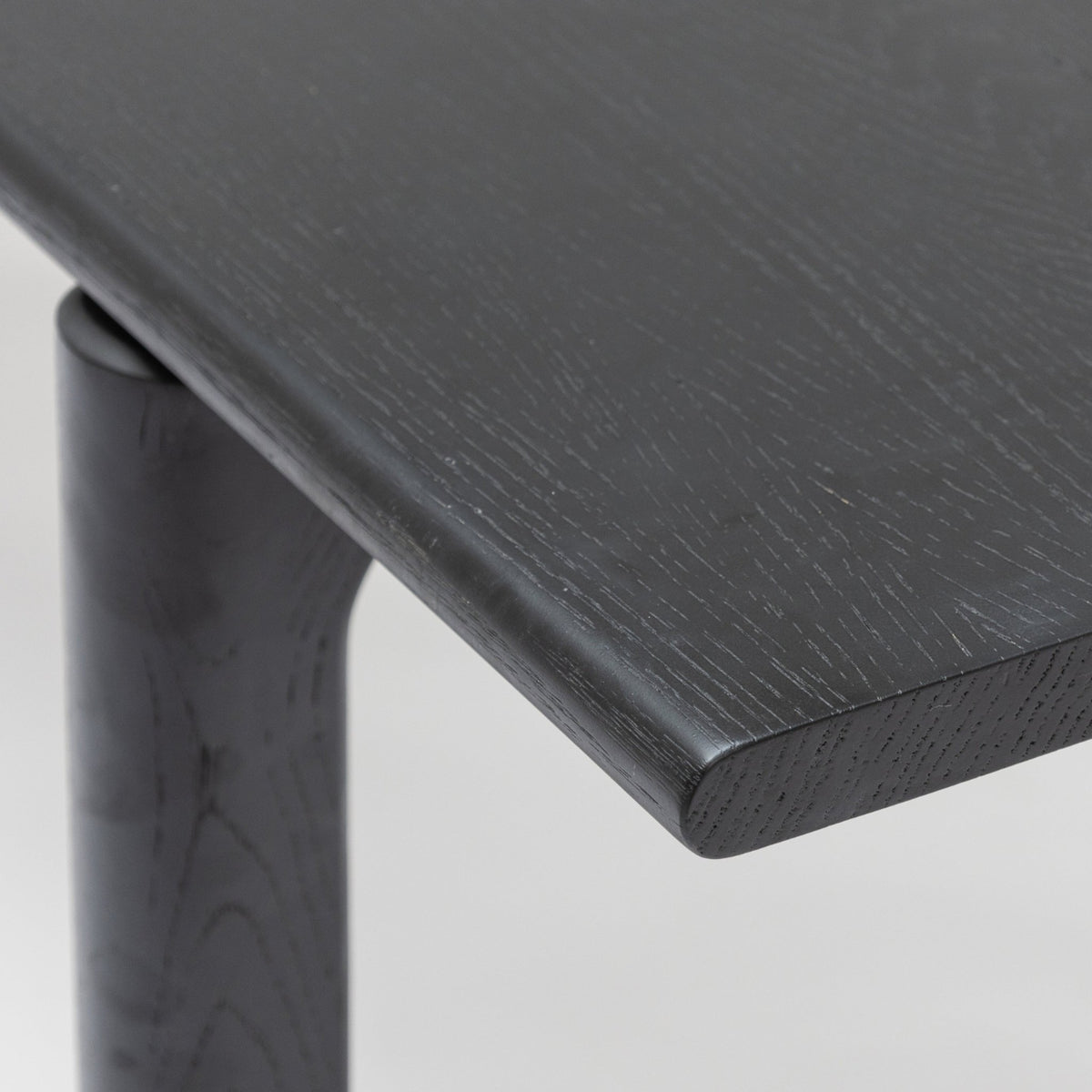 Hover Dining Table - Black Oak