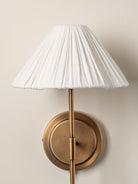 Lindi - Aged Brass And Linen Scalloped Wall Light