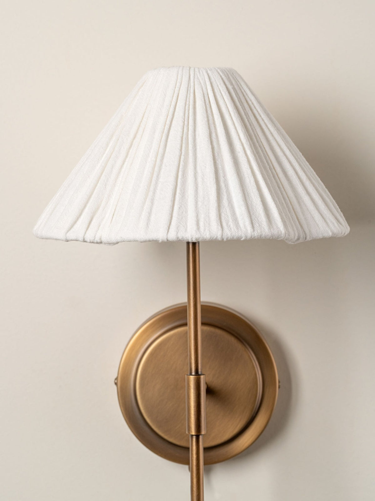 Lindi - Aged Brass And Linen Scalloped Wall Light