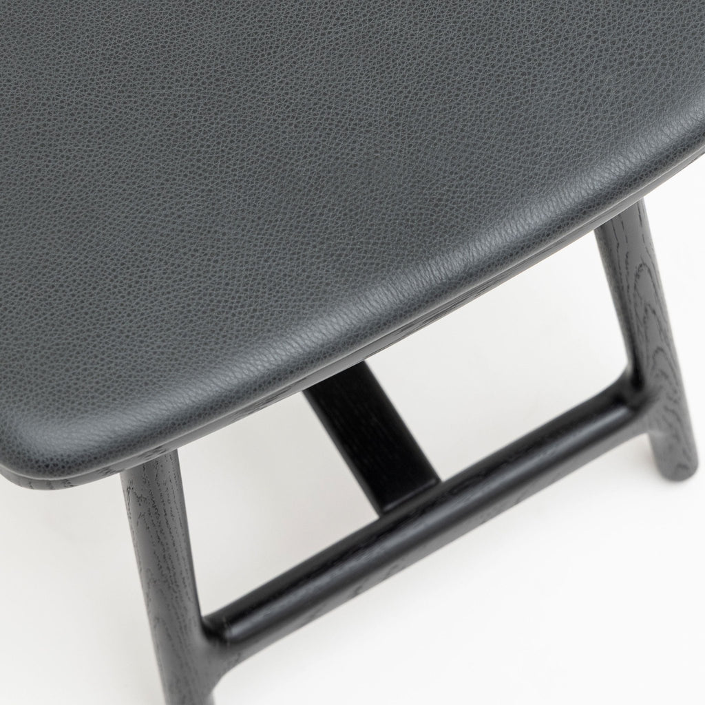 Odd Low Stool - Black Oak & Charcoal Leather - Bar & Counter Stools Tolv Loom Collection Dubai