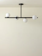 Perch - 4 Light Matt Black And Opal Pendant Bar