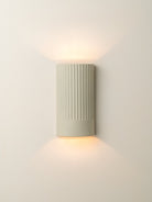 Enza - Warm White Ribbed Concrete Wall Light