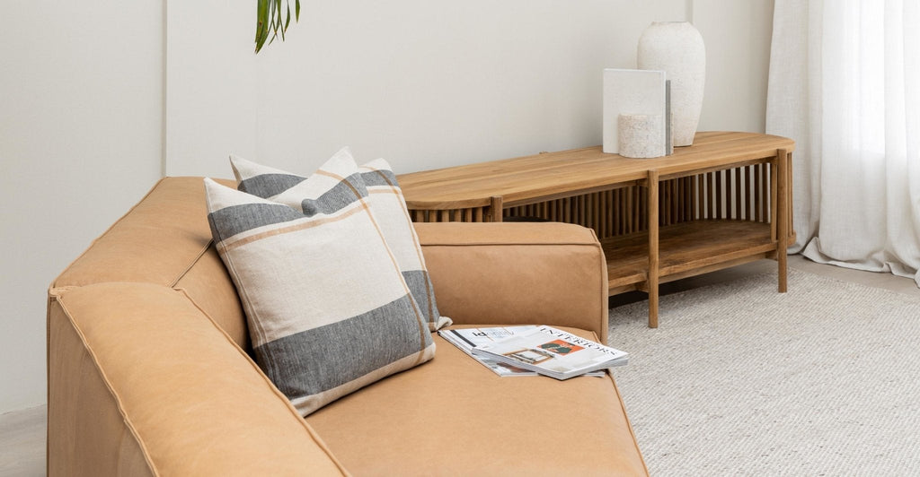 Baker Curved Sofa - Pecan Leather.